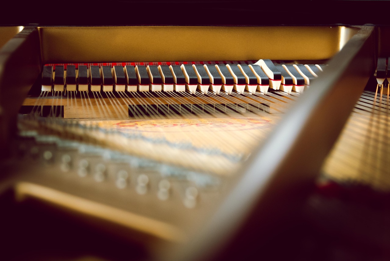 ¿Cuál es el tamaño de un piano de media cola?